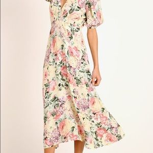 Faithfull the Brand midi floral dress style featuring a V-neckline